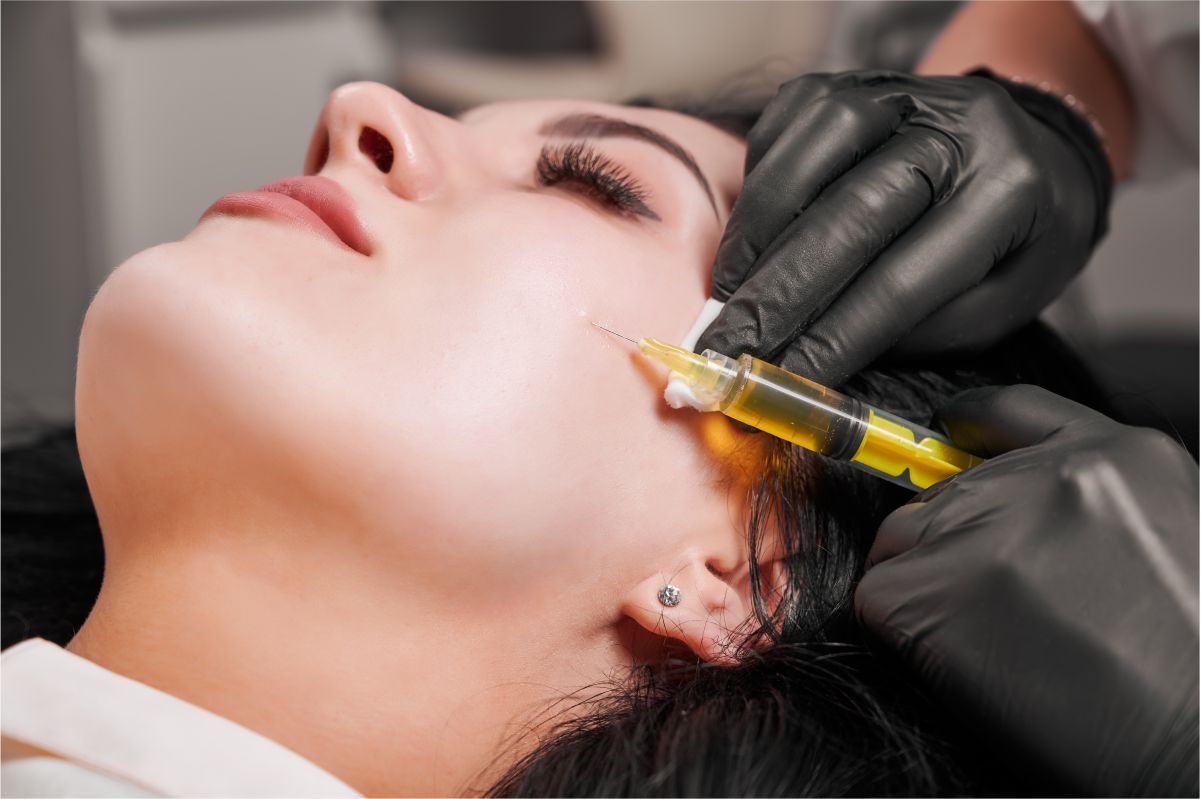 Women receiving mesotherapy injection to face
